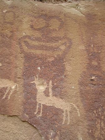 Authentic petroglyphs (background red), "Modern" petroglyphs (chiseled in foreground).