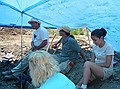 A break in the digging while listening to Kirk Johnson explain the area.