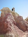 Jane & Kirk atop the ancient (white) riverbed which provides the caprock for the paleosol at the Calhan Paint Mines.
