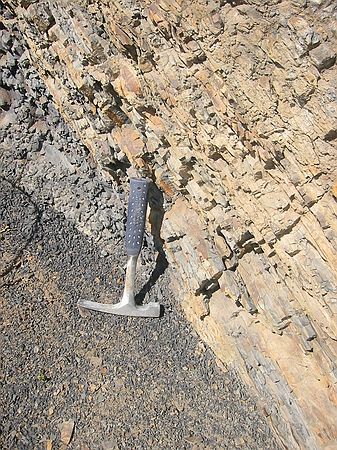 Dakota Formation - Contact point in Dakota formation where marine shales (gray) meet beach sandstones (tan).