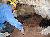 In the cave: Jim Cornette marking the grid where we were excavating.