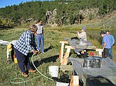 At screen washing site, a pond on Forest Service land.