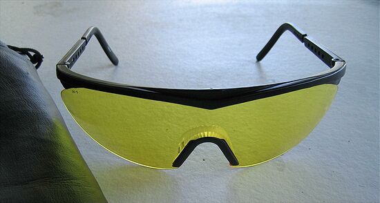 Bright-colored eye protection\n(Remington shooting glasses)